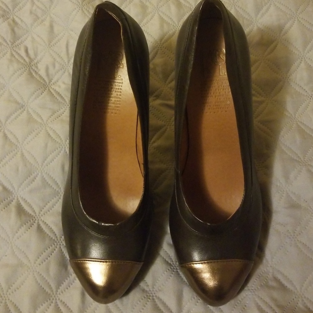 Brown leather pumps